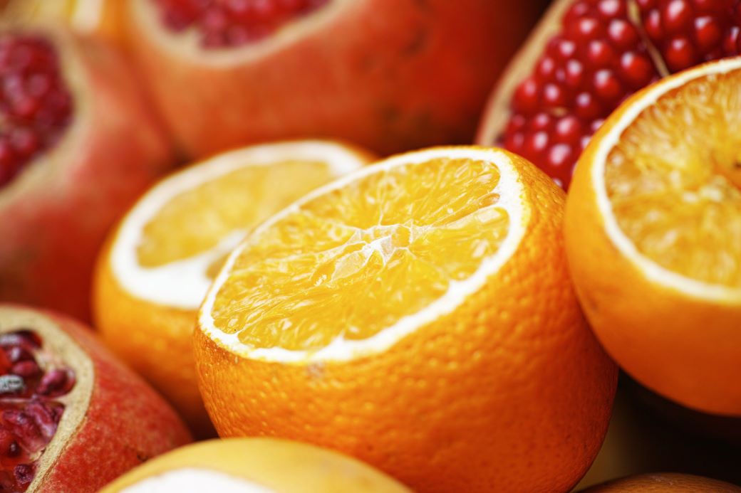 Nahrungsergänzungsmittel Orange und Granatapfel